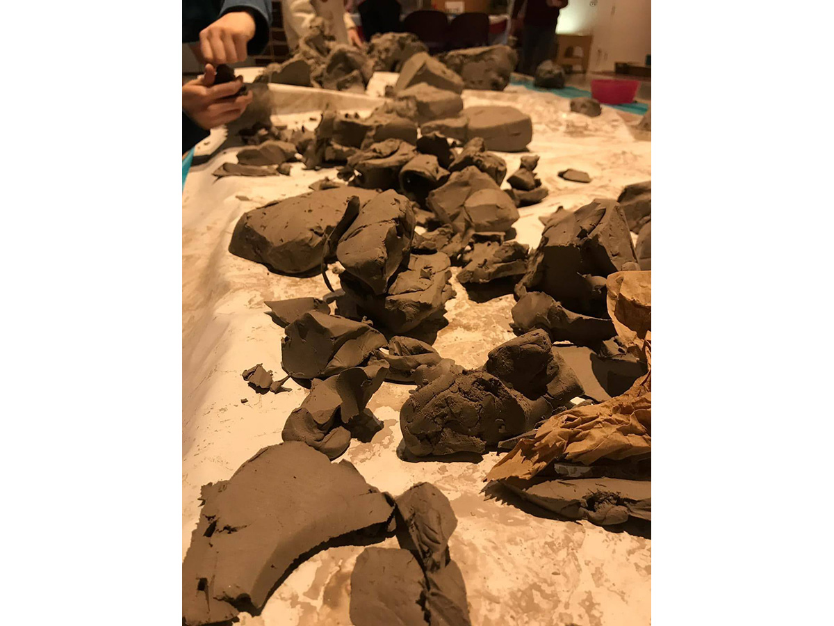 Various chunks and blogs of wet clay.